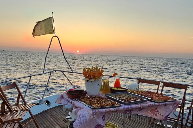SciatumiaDay boat tour to Lampedusa with typical lunch - Lampedusa Coves and a Table-Served Lunch Moment