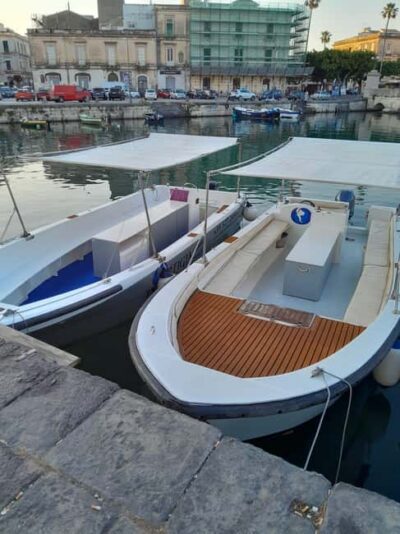 Siracusa: Ortigia Boat Tour with Marine Grotto & Snorkeling - From Il Catanese di Carpinelli to Umbertino Bridge: the coastal views that feel new