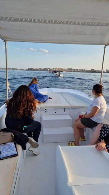 Siracusa: Ortigia & Sea Caves Boat Tour w/ Prosecco & Fruit - Meeting Outside A Surgiva: Your Easy Start in Ortigia