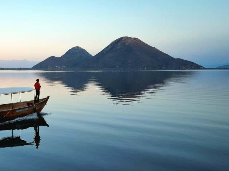 Skadar Lake: Guided Sunset Boat Tour with Wooden Boat & Wine - Price and value: $26 for a guided sunset on water