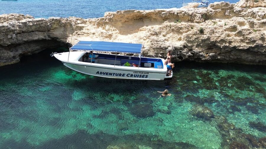 Sliema: Boat Trip to Comino Blue Lagoon, Gozo, and Caves - Caves along Comino coast: seeing the limestone from the water