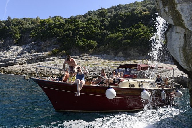 Small Group Boat Tour Capri & Blue Grotto with Swimming Stops - Onboard food and open bar: what’s actually included