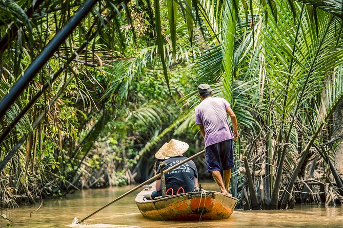 Small-Group Mekong Delta Day Trip: Boat Ride, Cottages & Pagoda - Cruising the canals near My Tho: what the boats actually feel like