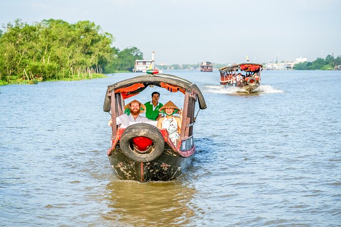 Small-group Mekong Floating Market Day Trip from Ho Chi Minh City - Minivan comfort, then boats: how the day flows