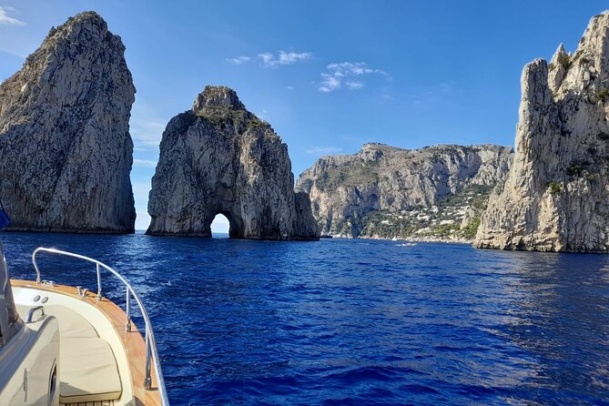 Small Group Tour from Salerno to Capri by Boat - Stop 3: I Faraglioni swim stop with big-photo energy