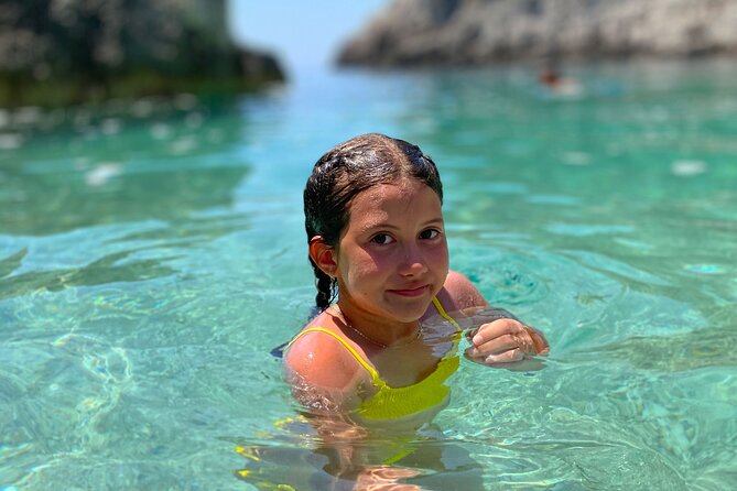 Speed Boat Tour to National Park and Grama Bay - Plazhi i Llovizit (Gjiri i Inglezit): cliffs, turquoise water, and a recharge break
