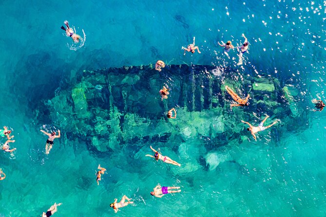 Split: Blue Lagoon, 3-Island Boat Tour & Mediterranean Lunch - The waterslide and jump ramp: where the day turns into pure fun