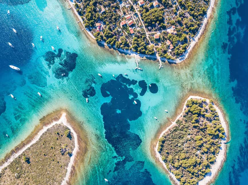 Split: Blue Lagoon and Šolta Boat Tour with Lunch and Drinks - Lunch on board with wine and unlimited soft drinks: simple, filling, and timed well