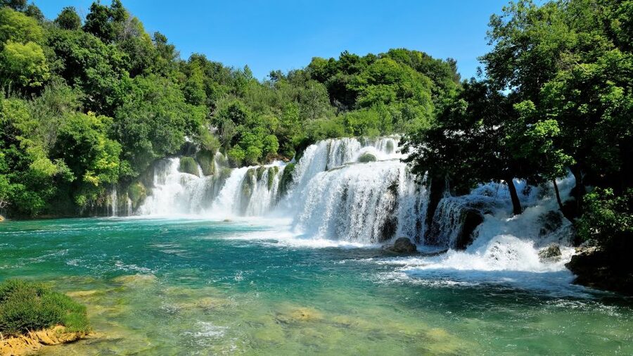 Split: Krka National Park Day Trip with Boat Ride & Swimming - The River Boat Ride to Skradin: Different Views, Easy Pace