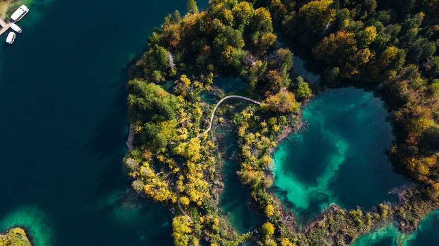Split: Self-Guided Plitvice Lakes Day Tour with Boat Ride - Inside Plitvice on Wooden Paths: Boardwalk Thrills and Water Sounds