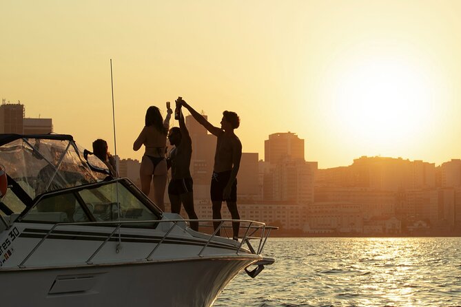 Sunset Boat Tour with Beer, Water, Soda and Snacks included - Adão e Eva Beach swim stop: pool noodles, ladder access, and possible rocking