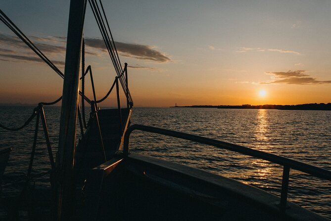 Sunset Experience | 2 hours boat trip at sunset time - Natural Stone Arch in Ciutadella: The Coast Up Close