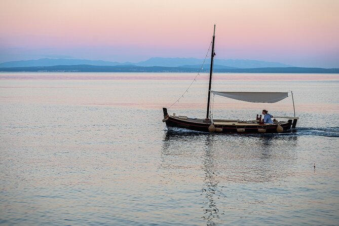 Sunset Ride Opatija on Madonnina Boat Tour - Volosko port stop: local spirit from the harbor side