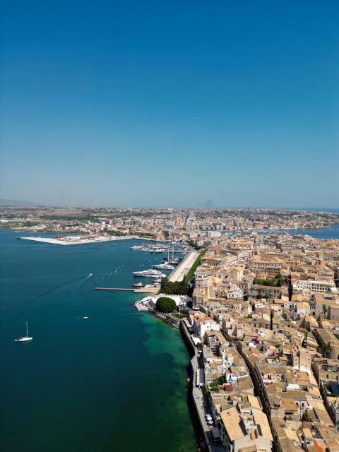 Syracuse: Boat tour Ortigia island,seacaves and Explanations - Quick hits you’ll care about