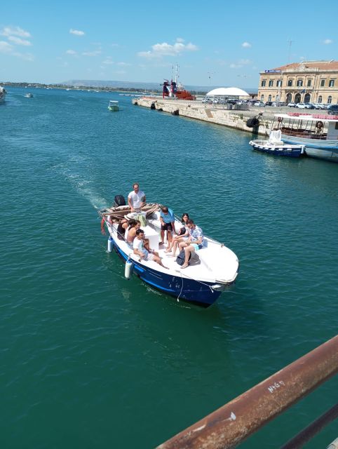 Syracuse: Boat tour Ortigia island,seacaves and Explanations - Getting on board: where the tour starts and how it feels