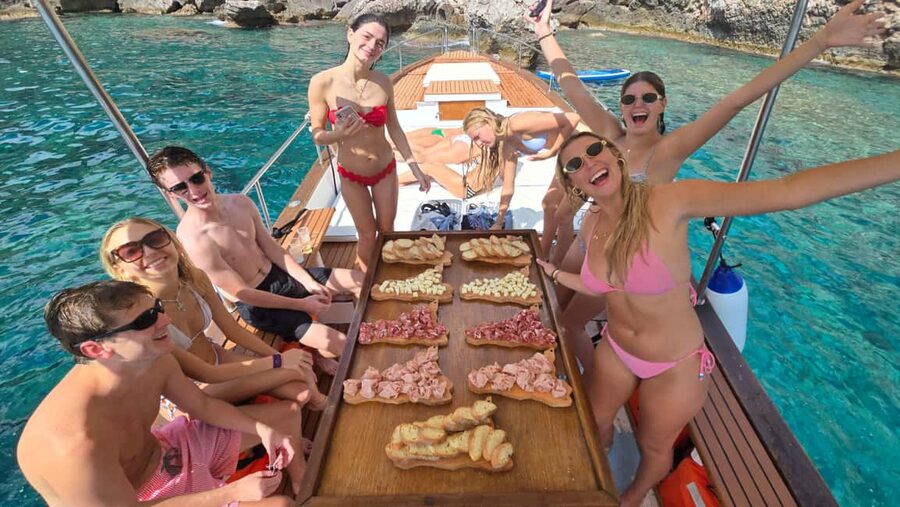Taormina: Boat Tour with Sicilian Wine Tasting - Blue Grotto photo stop: what to expect from the water