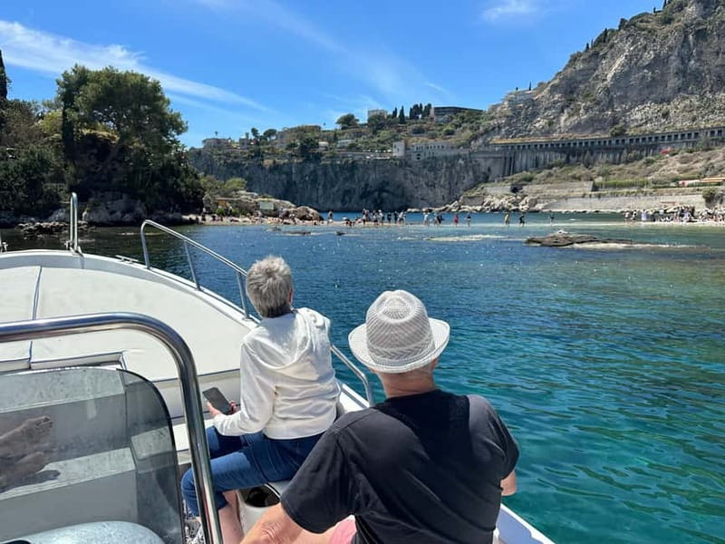 Taormina: Boat Tour with Sicilian Wine Tasting - Isola Bella snorkeling for 45 minutes: coral, fish, and smart swim time