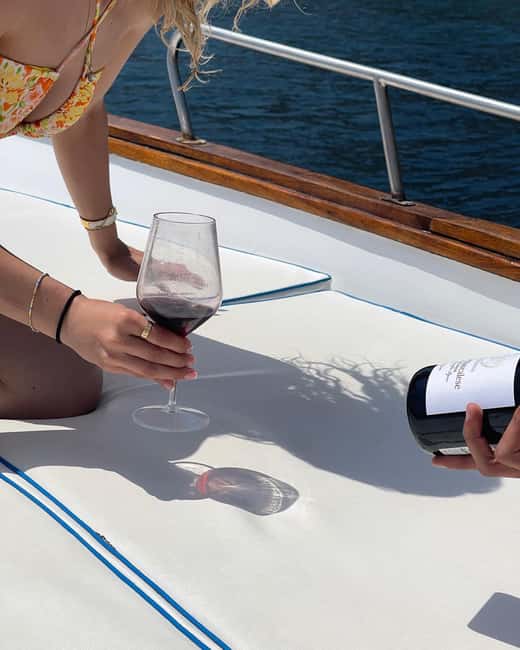 Taormina: Boat Tour with Sicilian Wine Tasting - Giardini Naxos sightseeing and the final stretch back