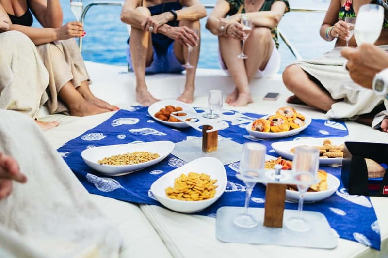 Taormina: Sunset Boat Tour with Dolphin Watching & Aperitif - Price and value: $118.95 for boat time, cave stops, and a swim