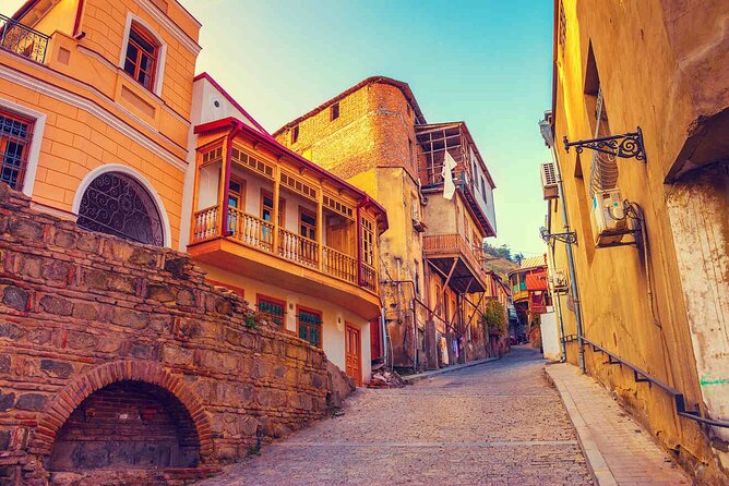 Tbilisi:Evening Walking & Talking Tour with Wine & Boat Ride - Kartlis Deda and the Old Town Finish: The City Symbol and the Narrow Streets