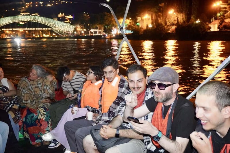 Tbilisi: Evening Walking Tour with Wine & Boat Ride Options - Liberty Square and the Angel Clock Tower show