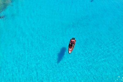 Three Greek Islands Full-Day Private Luxury Boat Tour - Stop 1: Karras Beach (Kimolos) and the sirmata view from the sea