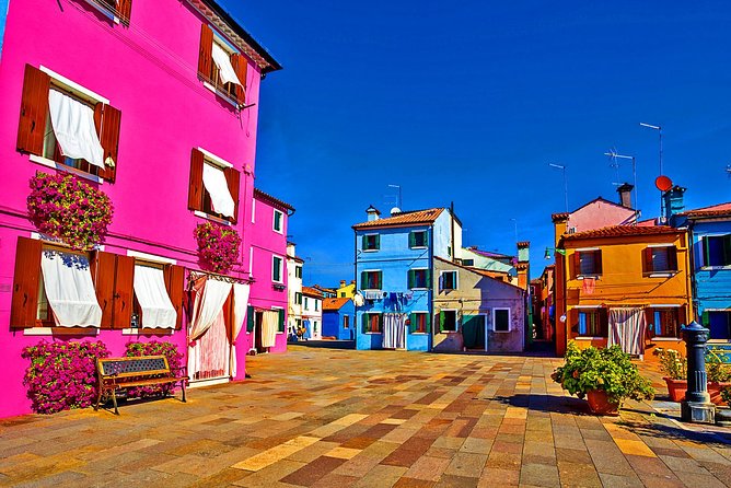 Venice Islands Cruise: Murano Glass, Rainbow Burano & Torcello - Burano: lace, leaning details, canals, and snacks