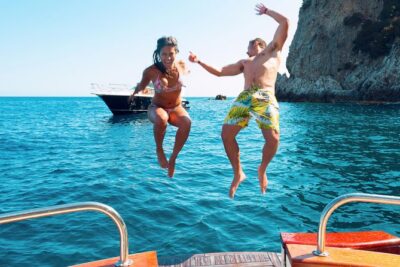 Very Small Group Capri Boat Excursion with Transfer from Positano - The boat cruise around Capri: caves, arches, and Faraglioni