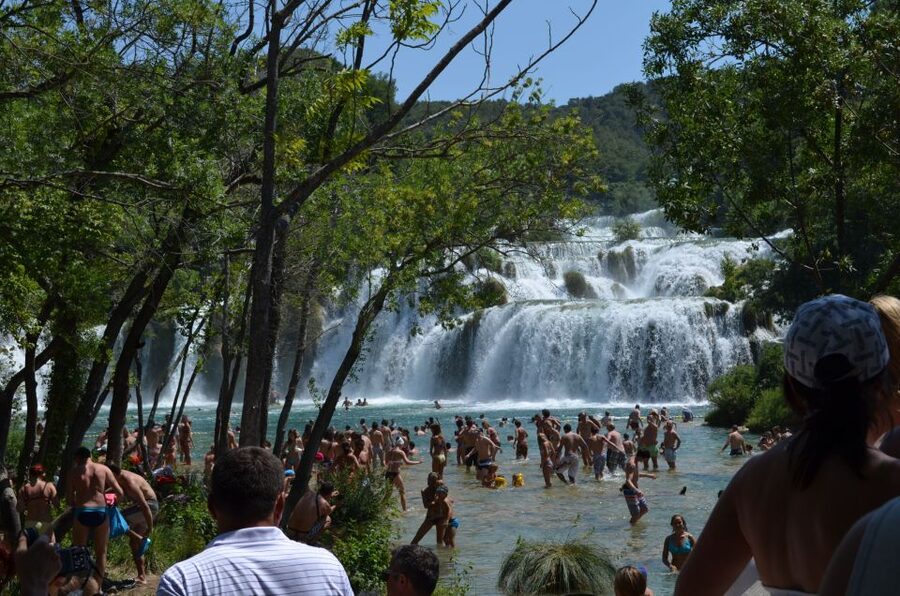 Vodice: Krka Waterfalls National Park Boat Tour - Setting Off from Vodice: Timber-Boat Views Start Immediately
