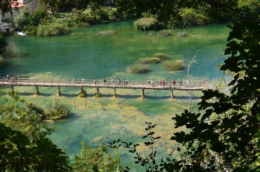 Vodice: Krka Waterfalls National Park Boat Tour - Arriving at Krka: Skradinski Buk, Watermills, and the Jaruga Power Plant