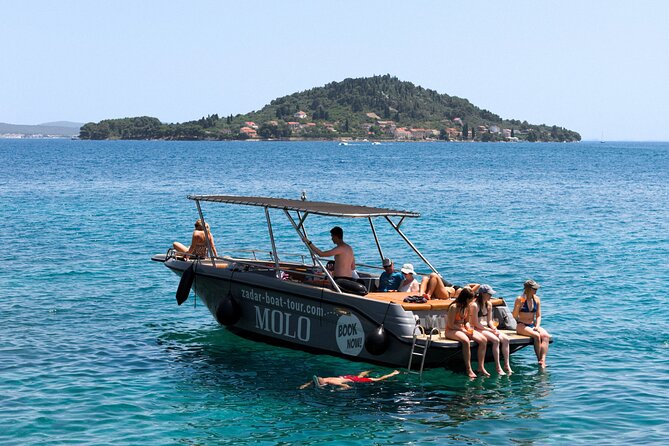 Zadar: 3 Islands Luxury Boat Tour with Aperol Spritz & Snorkeling - Stop 3 near Ugljan: Skoljic swimming and time for church and monastery sights