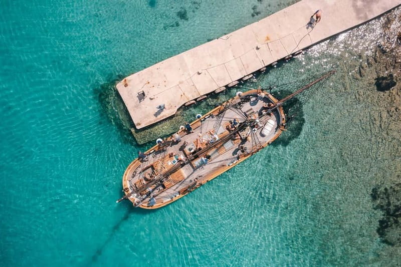Zadar: Boat Tour with Unlimited Wine & 3 Stops - Stop 3: Kali Village Beach Break and Srdela Snack Seafood
