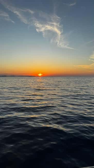 Zadar: Sunset boat tour with champagne - Meeting Point Made Simple: Pier by INA Gas Station