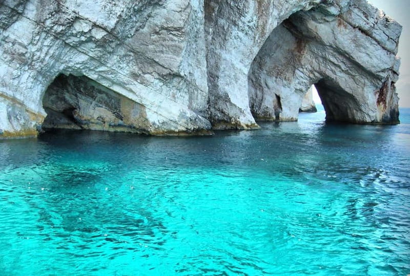Zakynthos: Xigia, Navagio Shipwreck and Blue Caves Boat Tour - Captain, crew, and group vibe: the human factor on a small boat